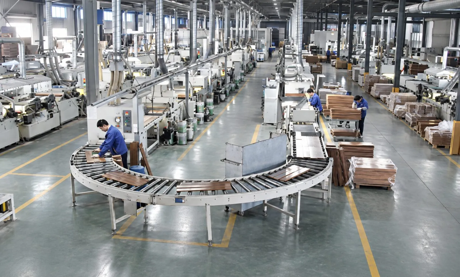 Workers on a flooring finishing line