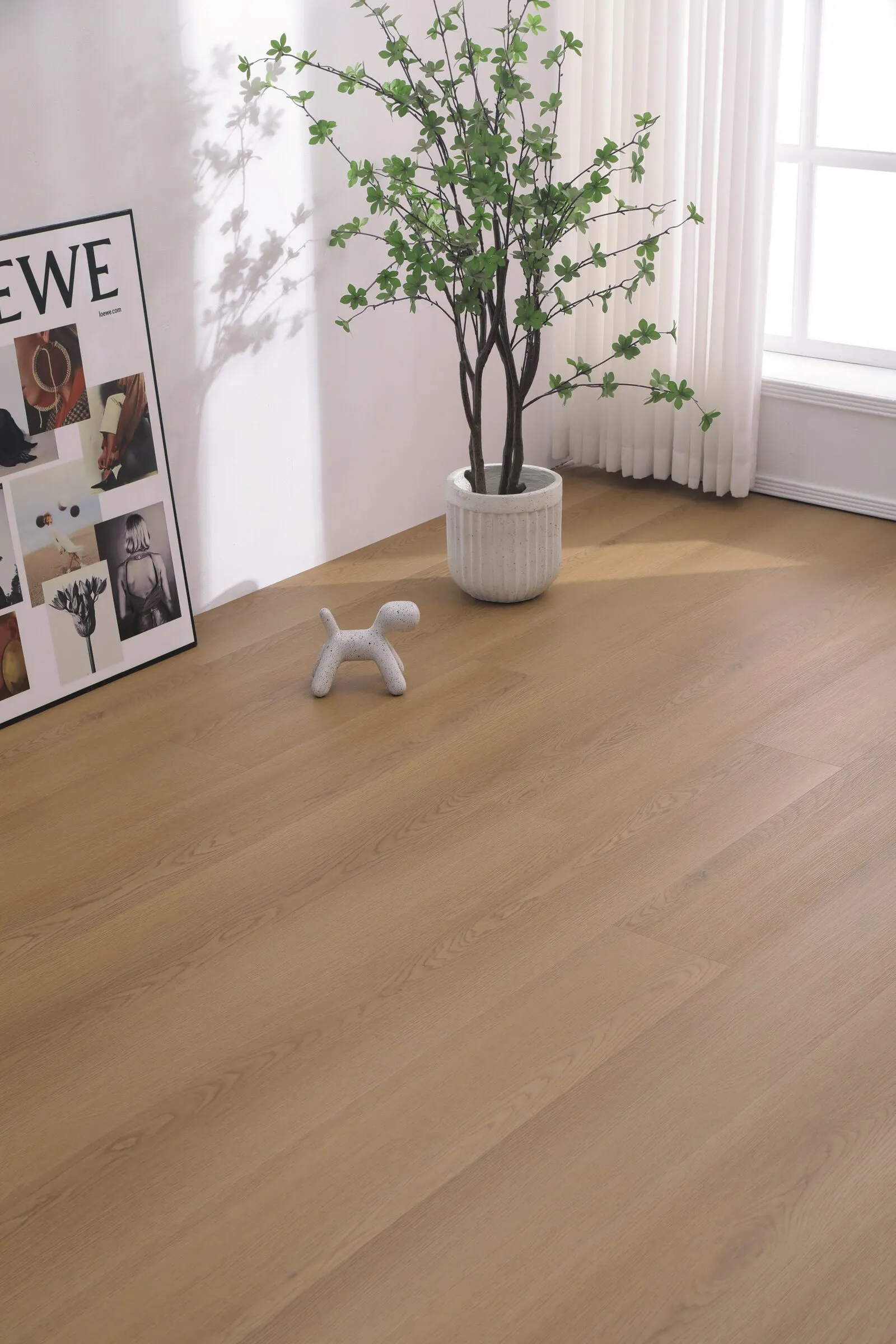 Light oak-look SPC flooring in a bright room
